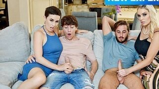 Two swinger couples practice hot synchronized sex on the couch