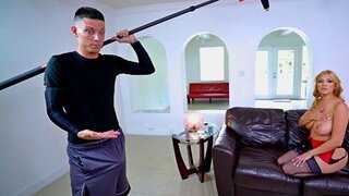 The cameraman on the set of erotica got excited and fucked a milf with big breasts on the couch